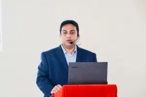Dr. Md. Abdullah Yousuf, a board-certified family medicine specialist in Gulshan, presenting a community health education seminar in Dhaka.