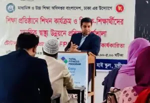 Dr. Md. Abdullah Yousuf presenting at a Total Fitness Program community health workshop organized with the Directorate of Secondary and Higher Education in Dhaka.